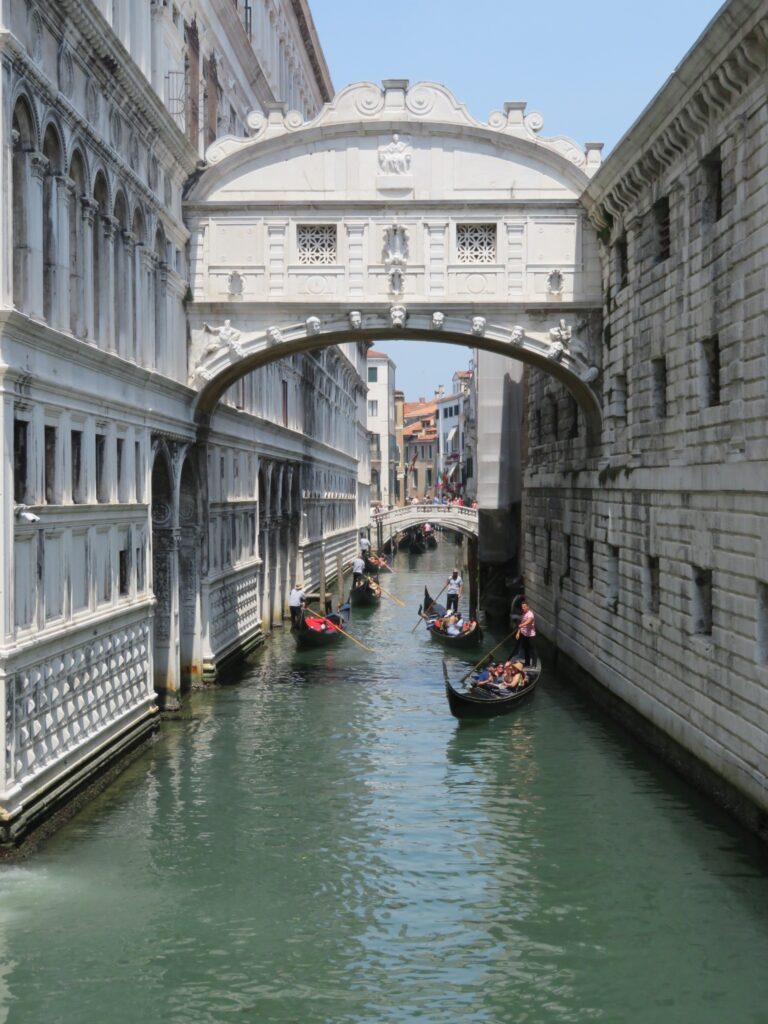 canals in Venice with gondoliers